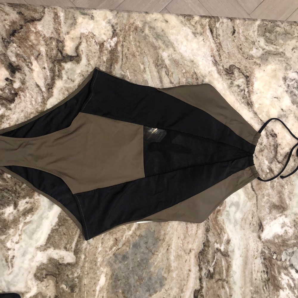 Brand New! One piece bathing suit.